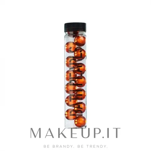 Perle da bagno all'arancia con profumo di pesca e orchidea